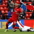 Senegal star Sadio Mane (L) playing for Liverpool against Crystal Palace in the Premier League last season