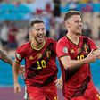 Thorgan Hazard (R) celebrates with his brother Eden after scoring Belgium's goal against Portugal in Seville