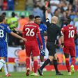 Anthony Taylor shows a red card to Chelsea defender Reece James