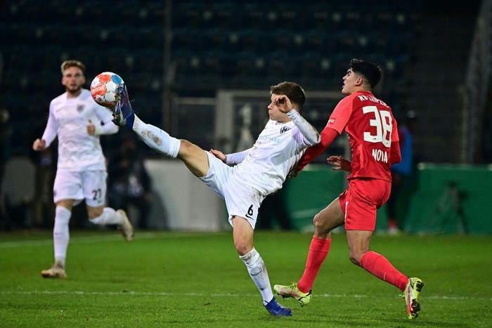 Leipzig’s Spanish forward Hugo Novoa (R) celebrated three first this week