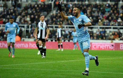 Riyad Mahrez (R) reacts after scoring for Manchester City in a 4-0 English Premier League victory at Newcastle United