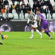 Juan Cuadrado lines up his match-winning shot against Fiorentina