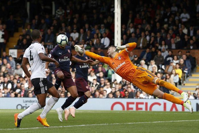 Chelsea signing - Goalkeeper Marcus Bettinelli (R) in action for former club Fulham