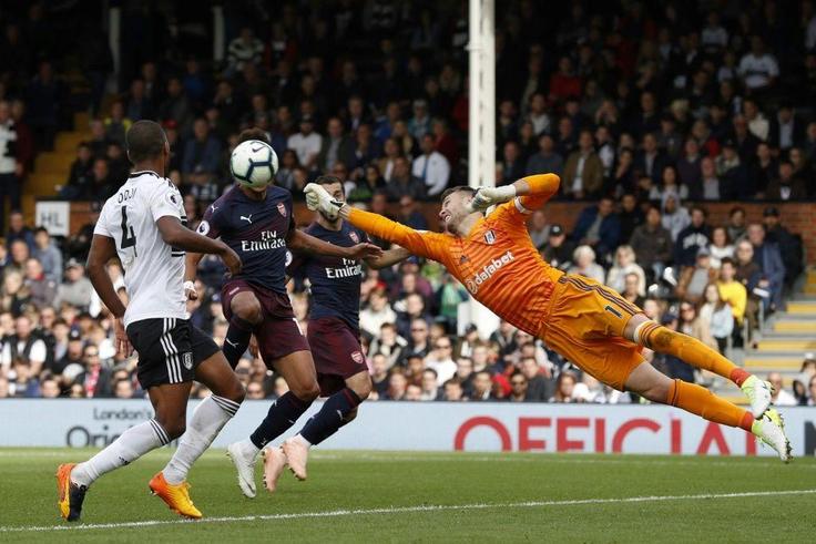 Chelsea signing - Goalkeeper Marcus Bettinelli (R) in action for former club Fulham