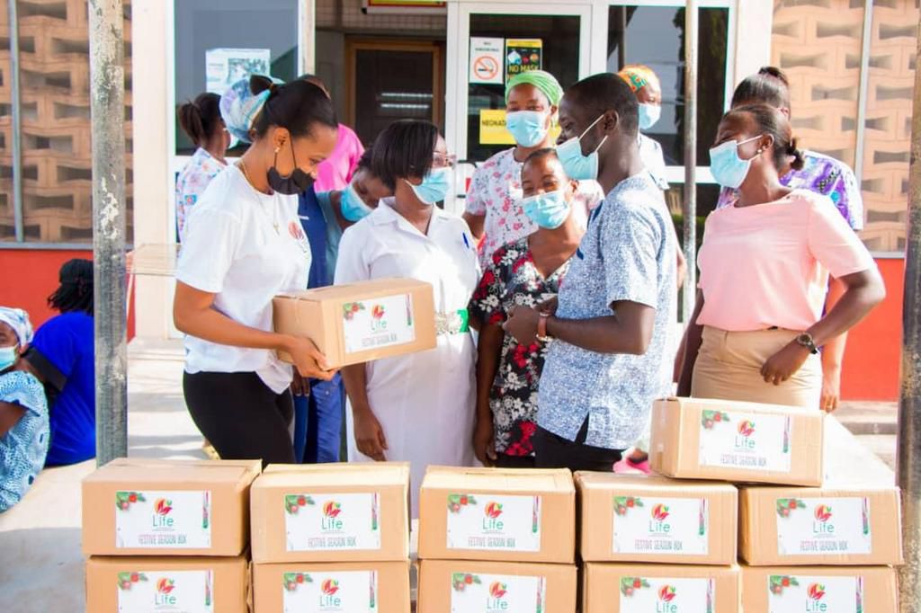 Stephanie Karikari celebrates with mothers at Winneba Municipal Hospital