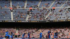Life after Lionel: Barcelona's players warm up before the Spanish League match against Real Sociedad