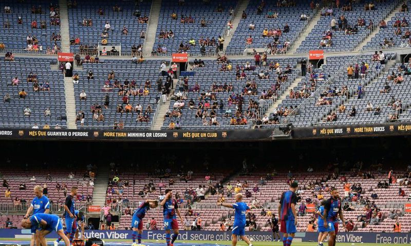 Life after Lionel: Barcelona's players warm up before the Spanish League match against Real Sociedad