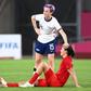 US forward Megan Rapinoe (C)