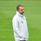 Germany head coach Hansi Flick (L) speaks to Chelsea forward Kai Havertz in training