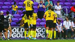 Jamaica's players celebrate after scoring against Guadeloupe