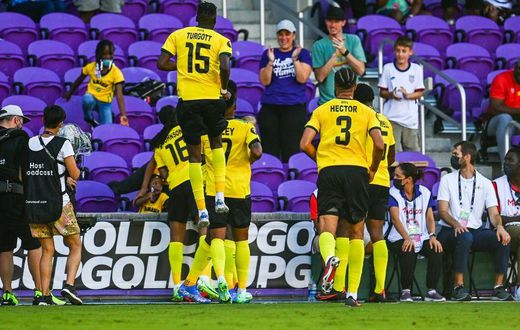 Jamaica's players celebrate after scoring against Guadeloupe