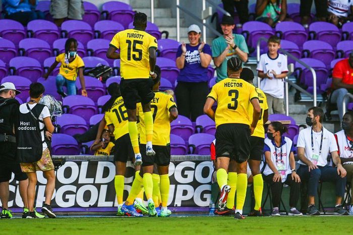Jamaica's players celebrate after scoring against Guadeloupe