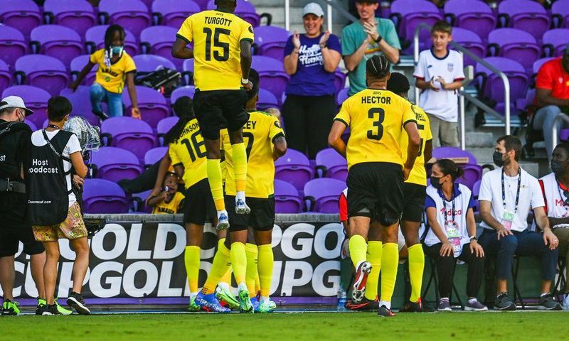 Jamaica's players celebrate after scoring against Guadeloupe
