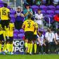 Jamaica's players celebrate after scoring against Guadeloupe