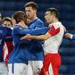 Ondrej Kudela (R) was given a 10-match ban for racially abusing Rangers midfielder Glen Kamara (C) earlier this year