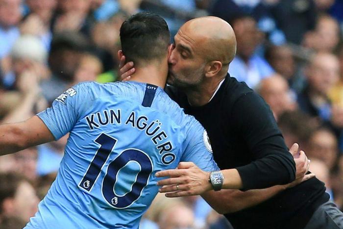 Manchester City manager Pep Guardiola kisses Sergio Aguero after he scored a hat-trick in 2018