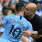 Manchester City manager Pep Guardiola kisses Sergio Aguero after he scored a hat-trick in 2018