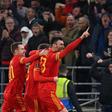 Wales striker Kieffer Moore (R) celebrates after scoring against Belgium