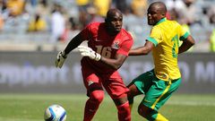 A file picture of Mamelodi Sundowns goalkeeper Kennedy Mweene (L) playing for Zambia against South Africa in a friendly match in Johannesburg