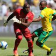 A file picture of Mamelodi Sundowns goalkeeper Kennedy Mweene (L) playing for Zambia against South Africa in a friendly match in Johannesburg
