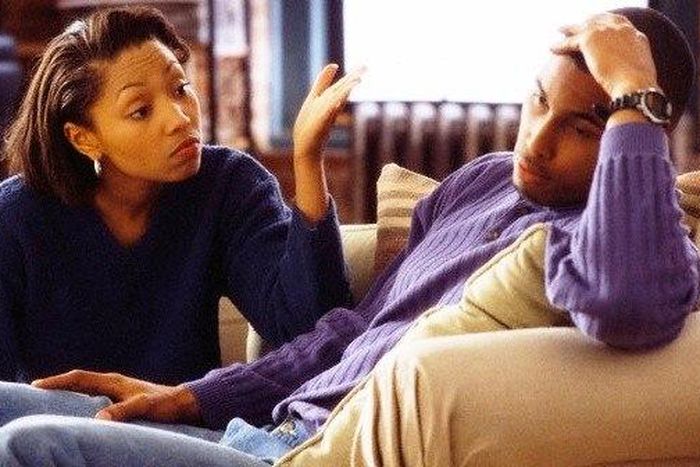 Black couples arguing.