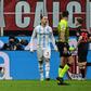 Franck Kessie (L) celebrates after scoring the opening goal for AC Milan