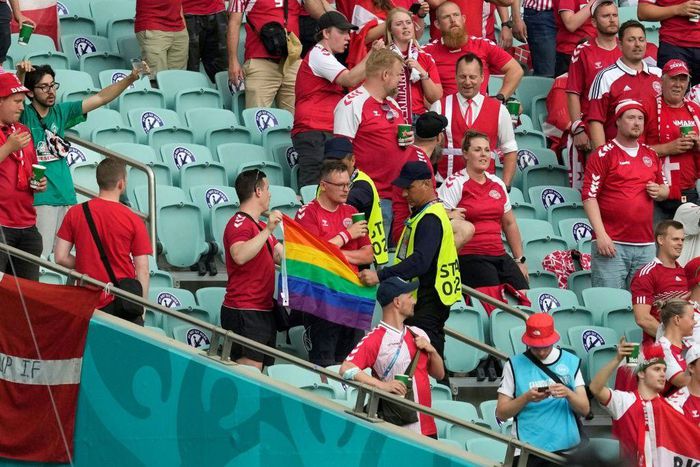 Stewards intervened after a Denmark supporter unfurled a rainbow flag at the Olympic Stadium in Baku
