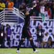 Mexico forward Rogelio Funes Mori celebrates after scoring his second goal in the second half of Mexico's 3-0 victory over Guatemala in the CONCACAF Gold Cup