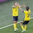 Viktor Claesson (L) celebrates his late winner against Poland