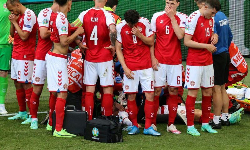 Denmark's players formed a protective ring around Christian Eriksen after he suffered a cardiac arrest in their opening match of Euro 2020 against Finland