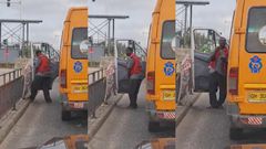 Trotro urinating in the middle of the road