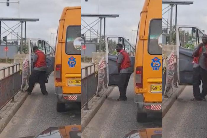 Trotro urinating in the middle of the road