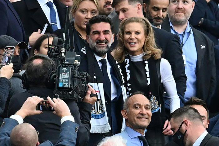 Newcastle's Saudi Arabian chairman Yasir Al-Rumayyan (centre) and minority owner Amanda Staveley (centre right)were given a hero's welcome at St. James' Park