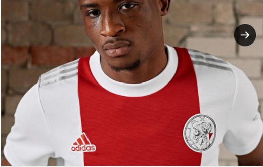 Mohammed Kudus models in Ajax’s new home jersey for 2021-22 season