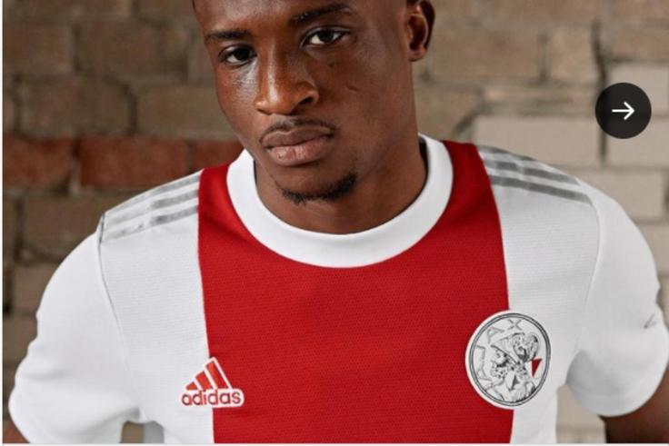 Mohammed Kudus models in Ajax’s new home jersey for 2021-22 season