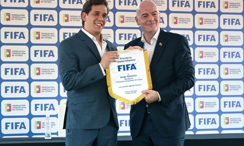 FIFA president Gianni Infantino (right) met the president of the Venezuelan Football Federation Jorge Gimenez during a visit to Caracas