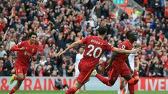 Sadio Mane (R) celebrates scoring for Liverpool against Burnley