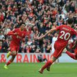 Sadio Mane (R) celebrates scoring for Liverpool against Burnley