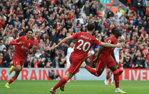 Sadio Mane (R) celebrates scoring for Liverpool against Burnley