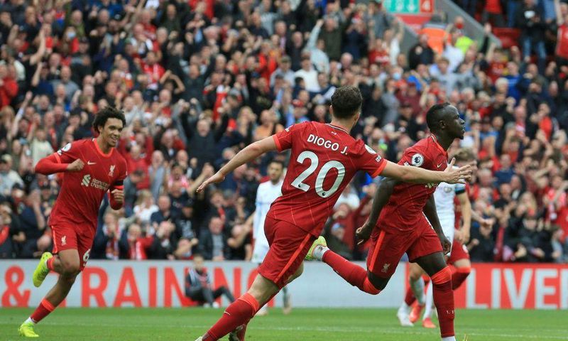 Sadio Mane (R) celebrates scoring for Liverpool against Burnley