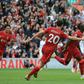 Sadio Mane (R) celebrates scoring for Liverpool against Burnley