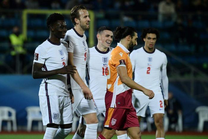Harry Kane (second left) celebrates with his England team-mates against San Marino