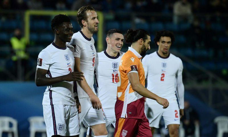 Harry Kane (second left) celebrates with his England team-mates against San Marino