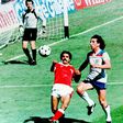 Paul Mariner, right, challenging Kuwaiti defender Abdullah Mayuf, for England at 1982 World Cup, has died at 68