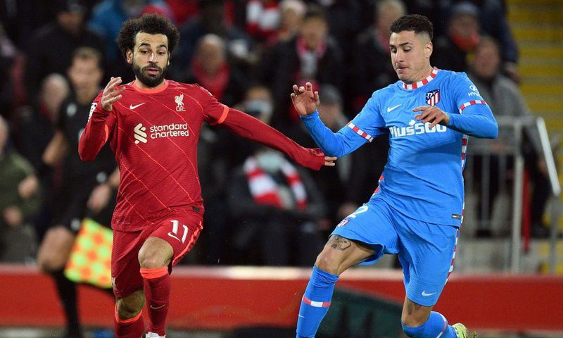 Egypt captain Mohamed Salah (L) playing for Liverpool against Atletico Madrid in the Champions League at Anfield.