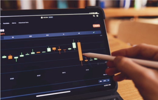 https://unsplash.com/photos/a-person-using-a-laptop-computer-with-a-chart-on-the-screen-InWI1lteYf U