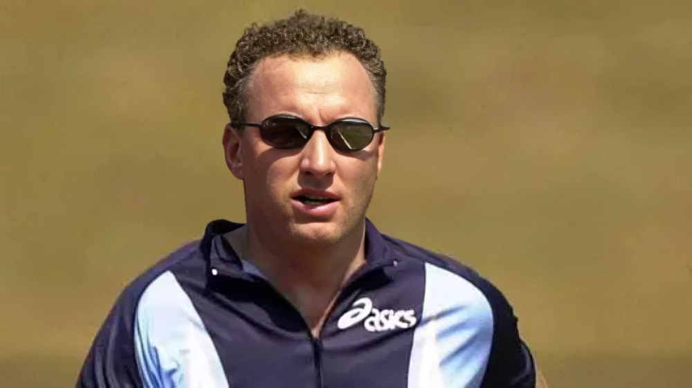Ex-Olympic coach charged with rape and assault of a child