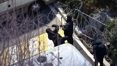 Investigators scale walls, cut barbed wire, arrest South Korea’s President