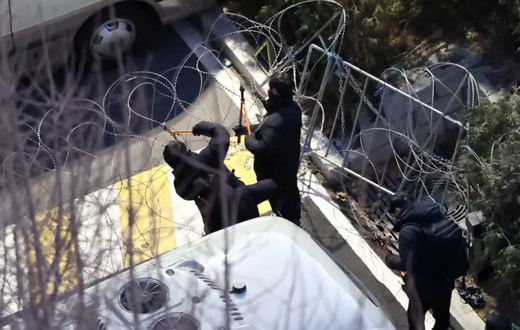 Investigators scale walls, cut barbed wire, arrest South Korea’s President