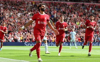 Mohamed Salah of Liverpool celebrates after scoring the team's second goal after scoring off the rebound of a missed penalty during the Premier League match between Liverpool FC and AFC Bournemouth 
Image credit: Getty Images